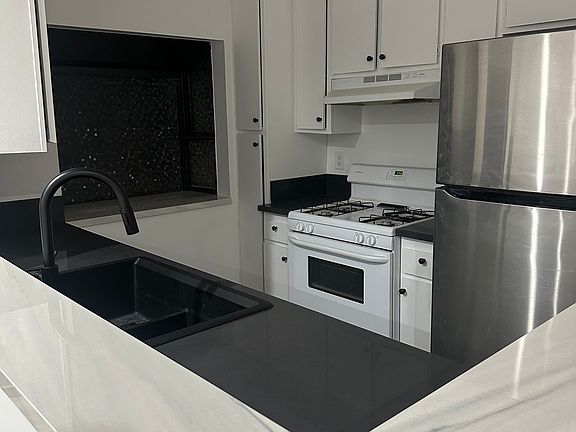 3rd image of 12573 Bradley Ave Unit 13