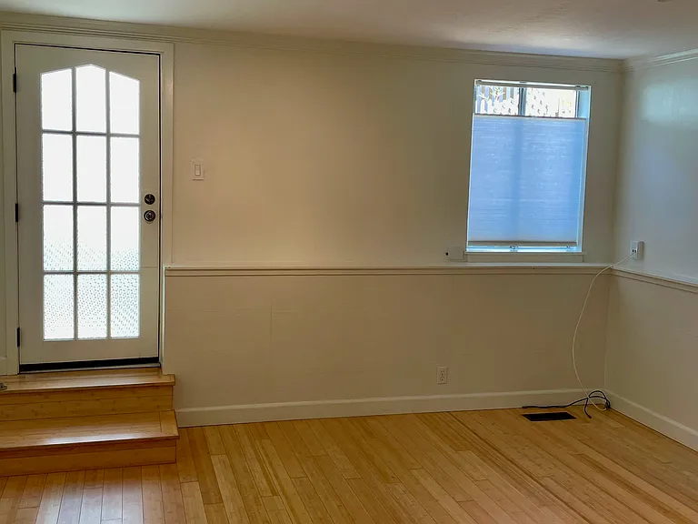 Track lighting, bamboo floors, plenty of room for a queen bed