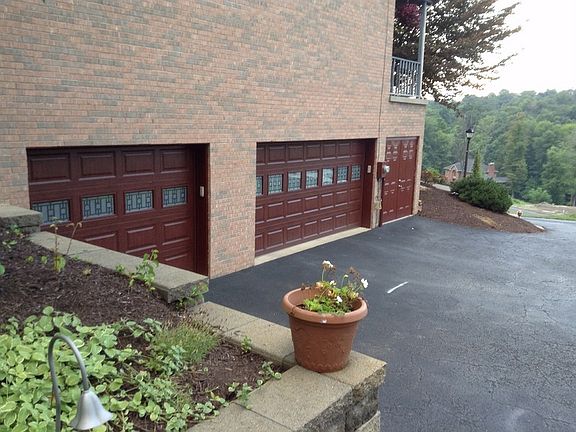 3-car garage
						:
						Brand new dark cherry garage doors.