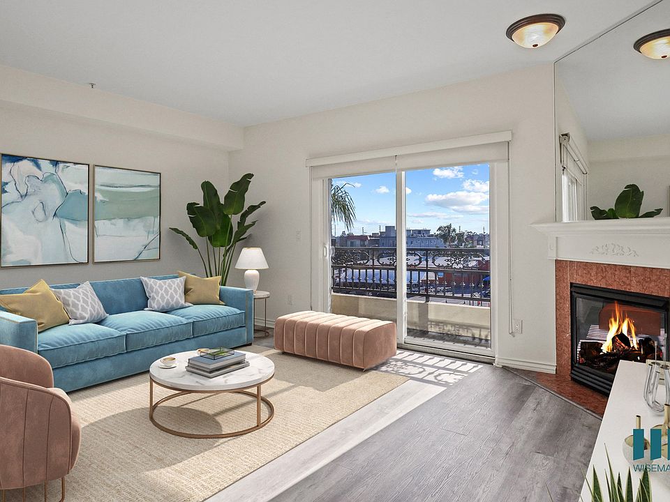 Large-Size Living Room with Electric Fireplace, Vinyl Flooring, and Balcony