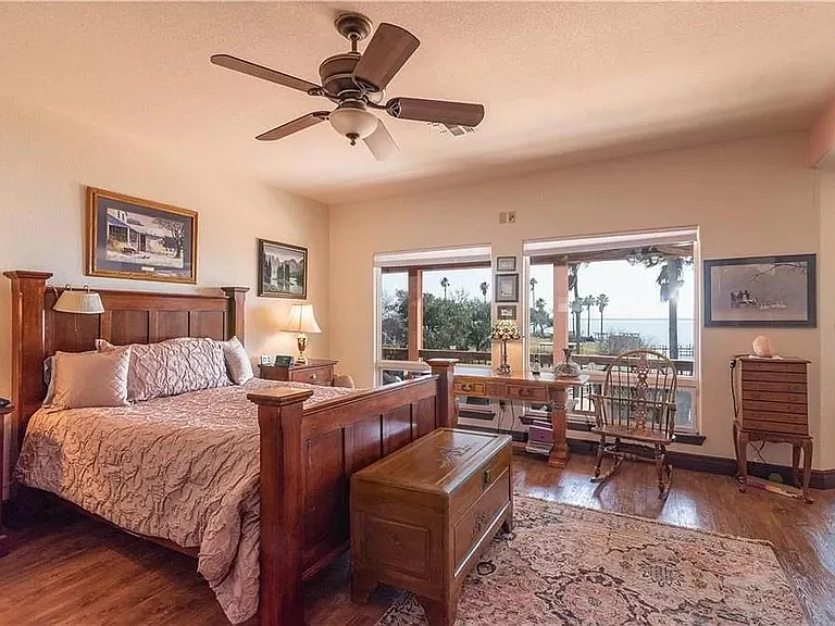HUGE owner's suite, with lake views, extra space, private bathroom and closet, private exit to covered car port, and private access to back patio. Enjoy a hotel / vacation-like feel every day!