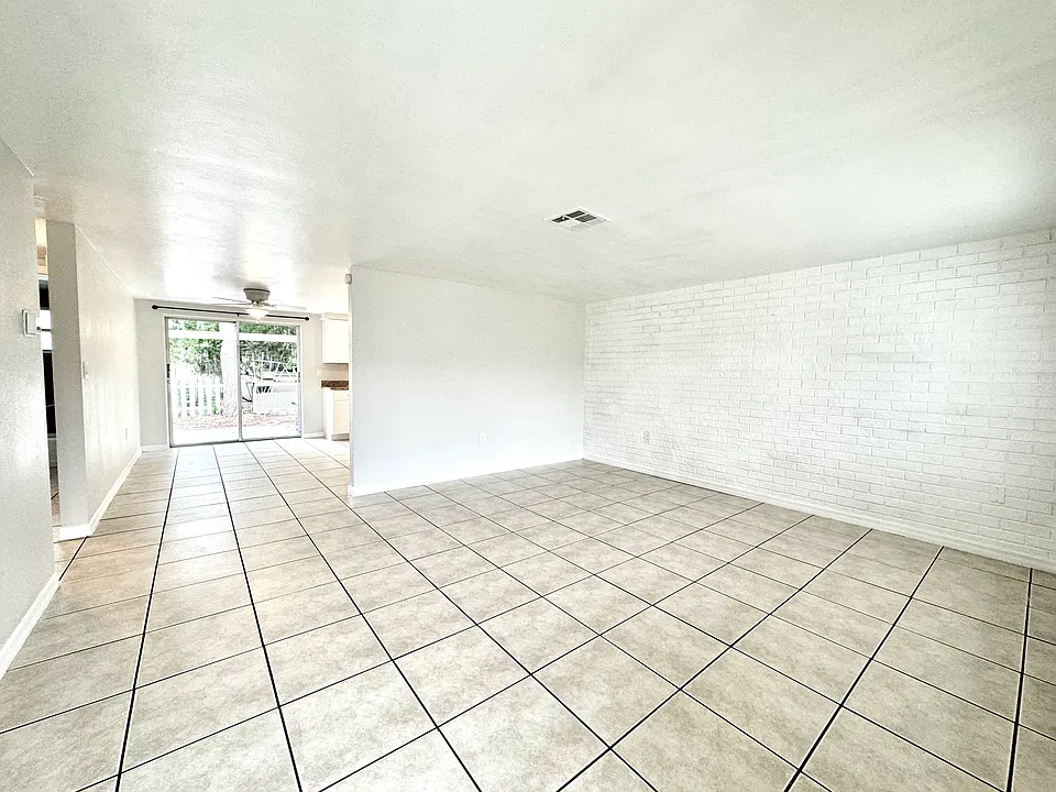 View from front door. Large living room into dining room