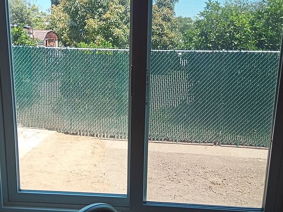 5th image of 8833 S Nogal Ave