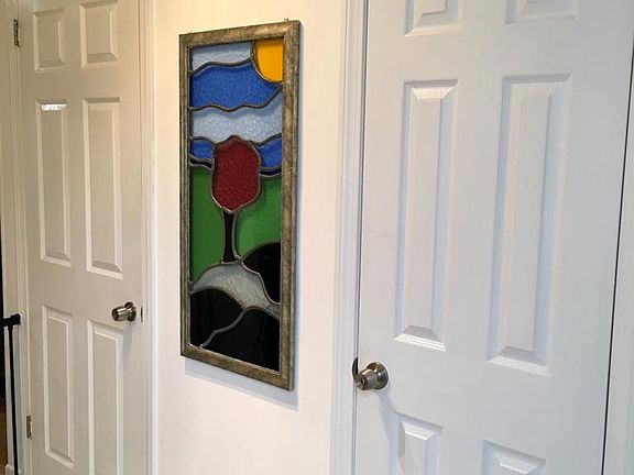 Foyer, half bath and closet