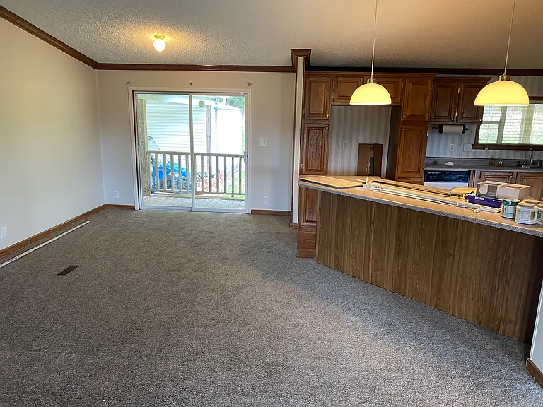 Breakfast Dining area and Sliding door to Backyard and Covered Carport