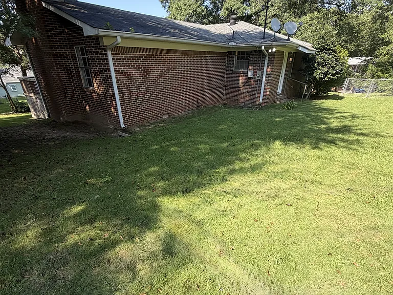 View from very back yard, door leads to kitchen