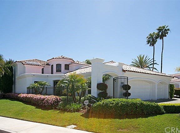 This amazing resort property boasts an over size lot estimated at 12,500 sq. ft.