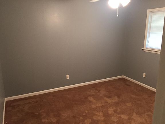 bedroom with new carpet