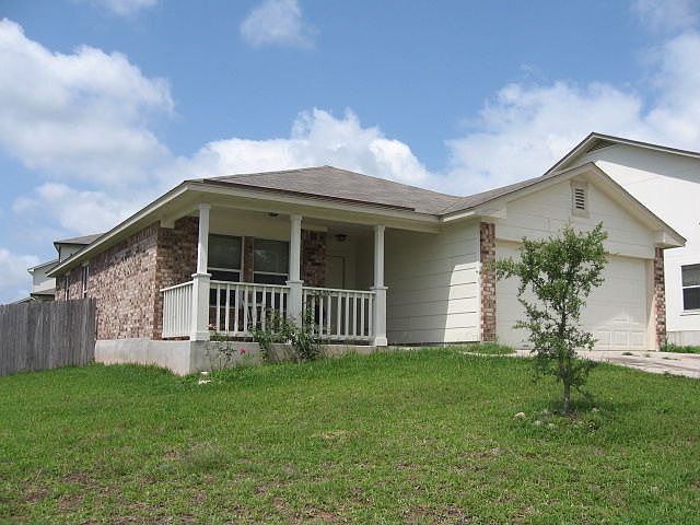 cute starter home sittling on a little hill with great view