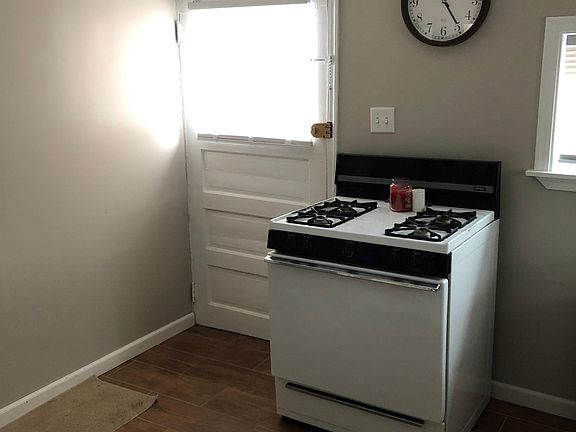Main entrance into kitchen. A small 2-seater table will fit in kitchen.