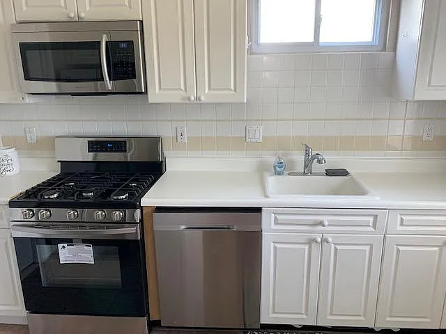 7703 Winchester Ave — Photo 7