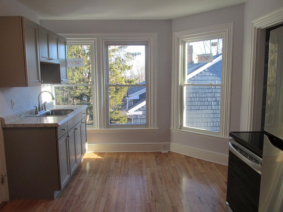 Kitchen, hardwood floors, new windows, cabinetry and appliances.