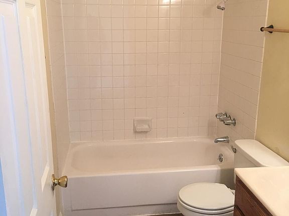 bathroom tub and toilet