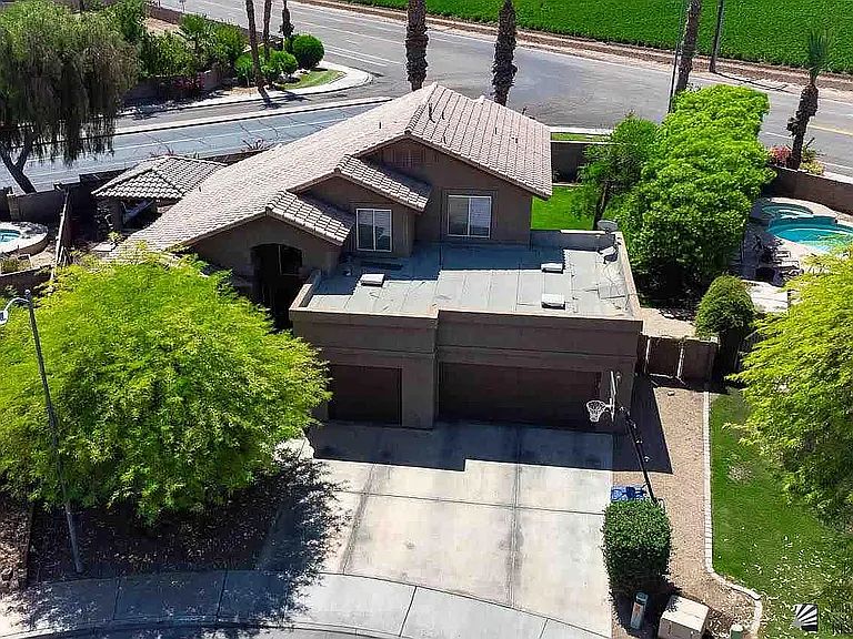 Ariel Exterior of home showing. Private backyard with views of field.
