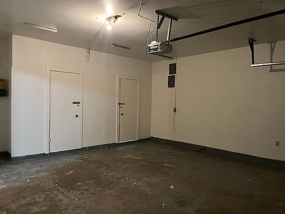 Extra storage for yard equipment and tools in garage