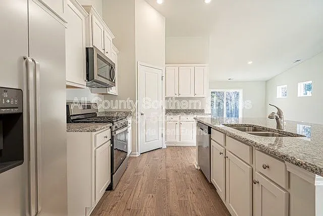 7023 Rivers Bridge Ct — Photo 9