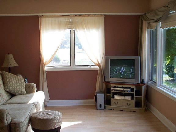 Living room with corner windows
