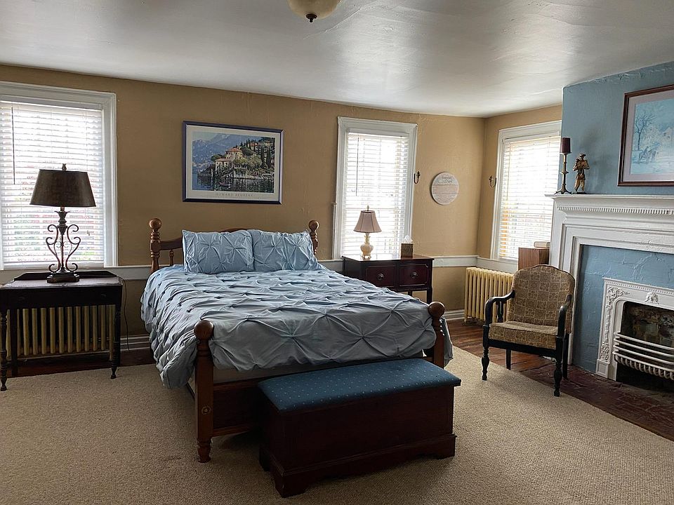 Bedroom with fireplace