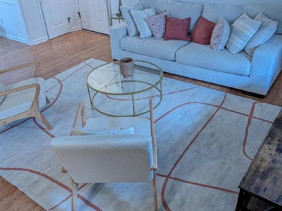 Living room near screened-in patio.