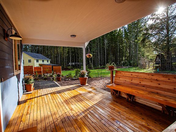 Private porch and yard on a shared lot.