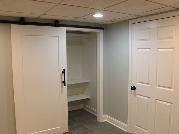 Bedroom with plenty of storage areas.