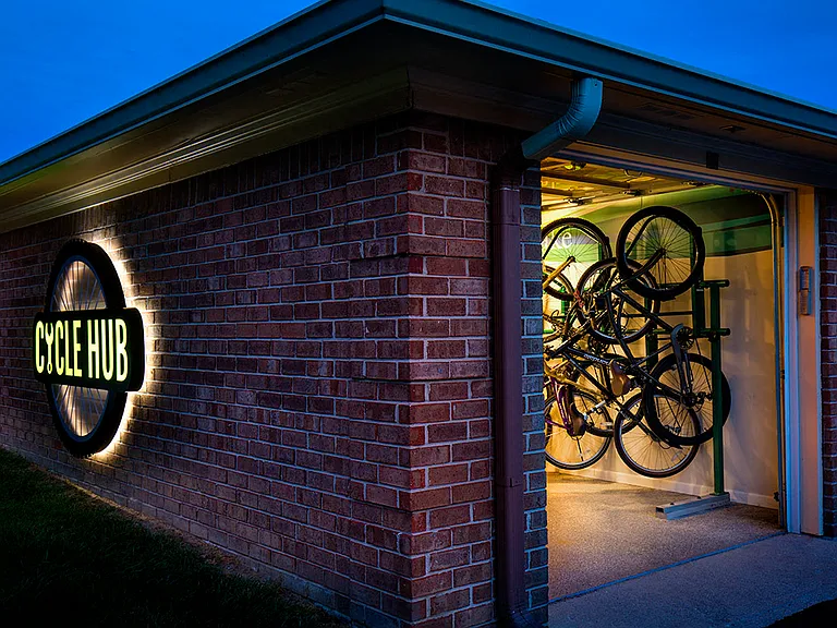 Cycle hub with indoor storage and repair station