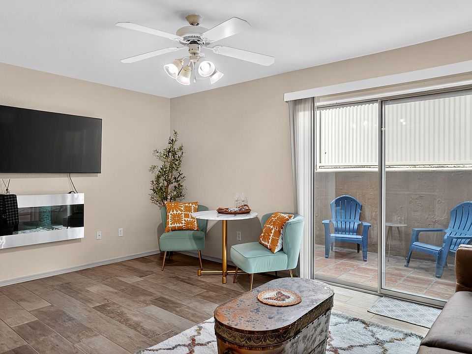 living room view with access to back yard patio with sliding glass door