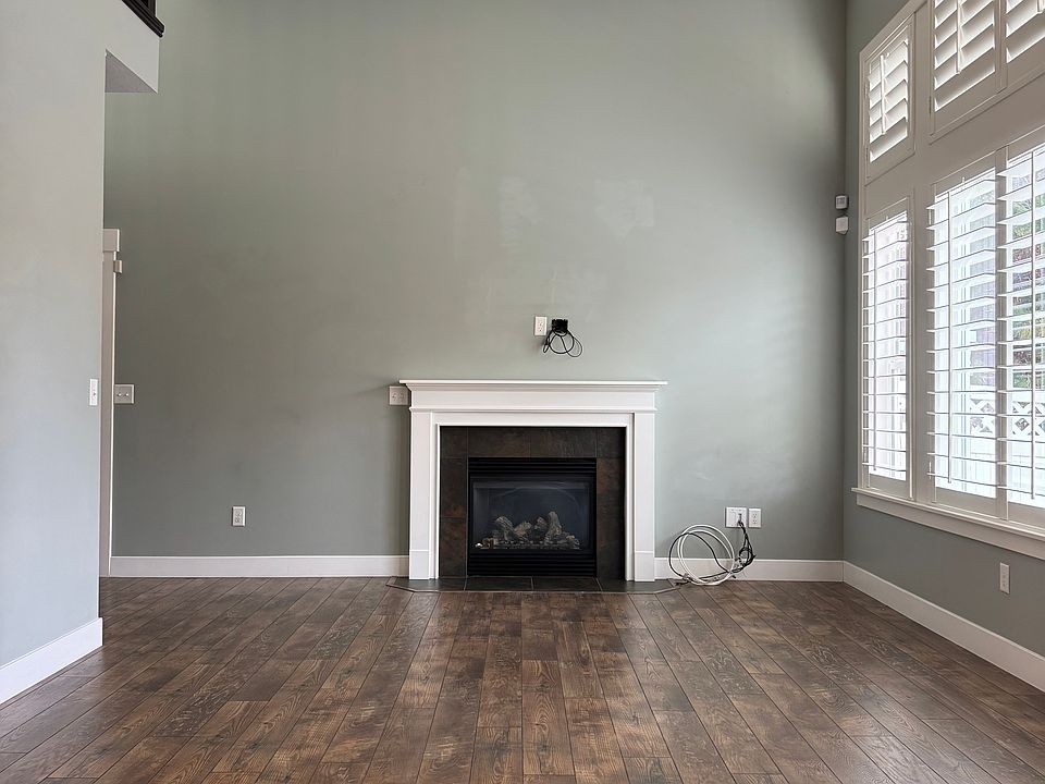 living room with electric heating fire place.