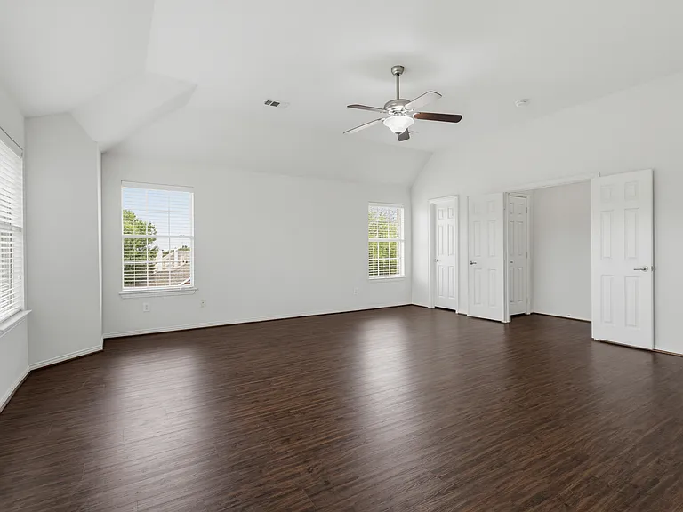 Huge master bedroom with his and her closets