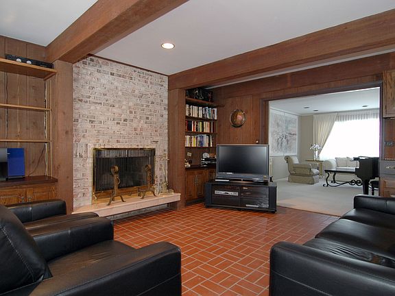 Family Room w/Wood Burning Fireplace