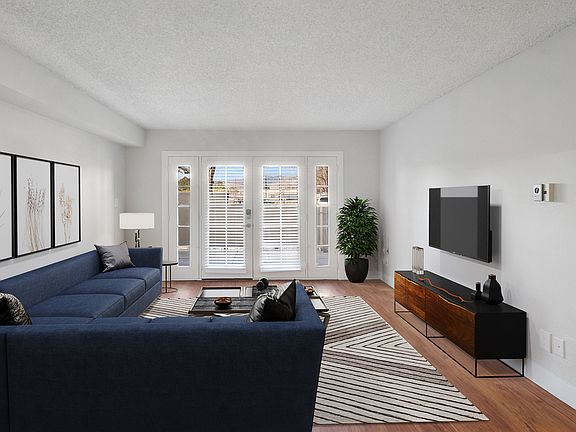 Bight and open living areas that open out to a spacious balcony