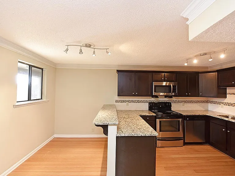 Experience modern cooking in this chic kitchen designed for style and efficiency.