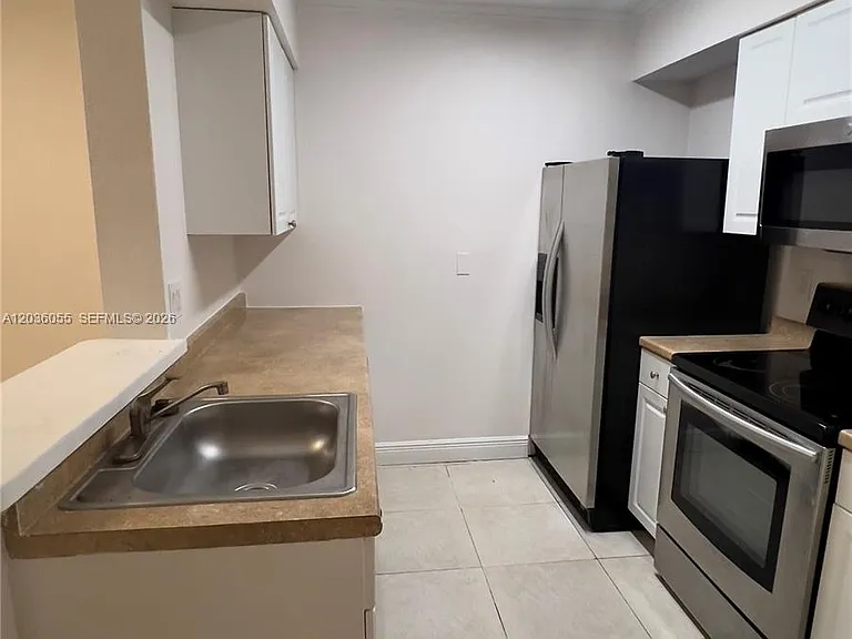 2880 N Oakland Forest Dr #107 — Photo 4