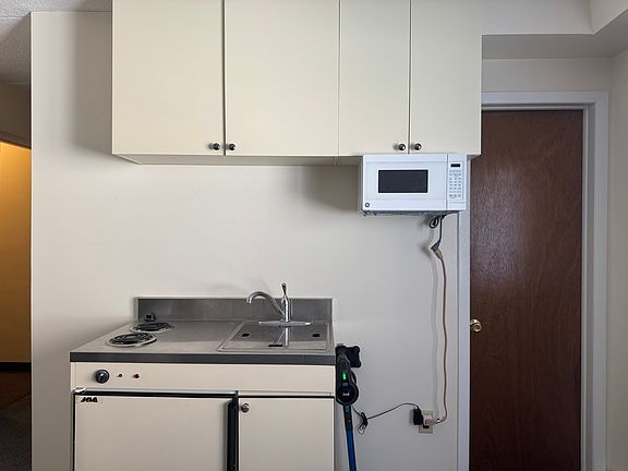 Kitchen with 2 burners,sink, micro
