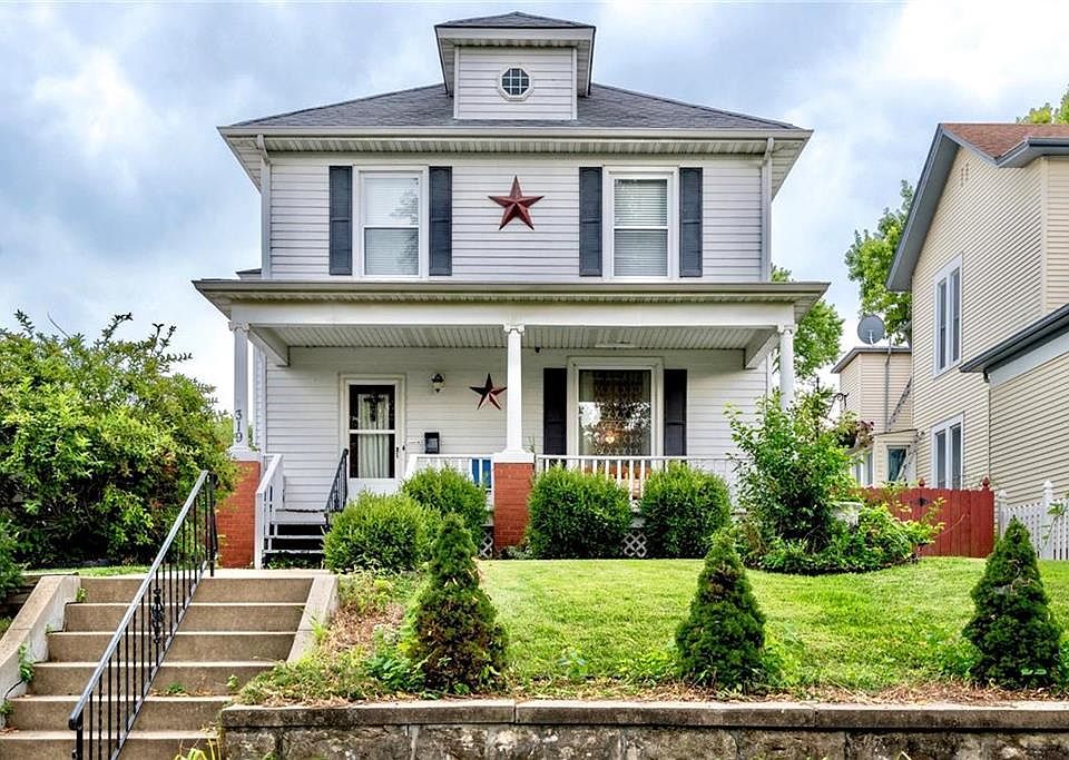 American Foursquare Design, Covered Front Porch, Low Maintenance Metal Siding!