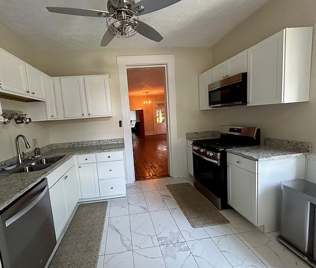 kitchen with all new appliances. extra large refrigerator that makes two types of ice