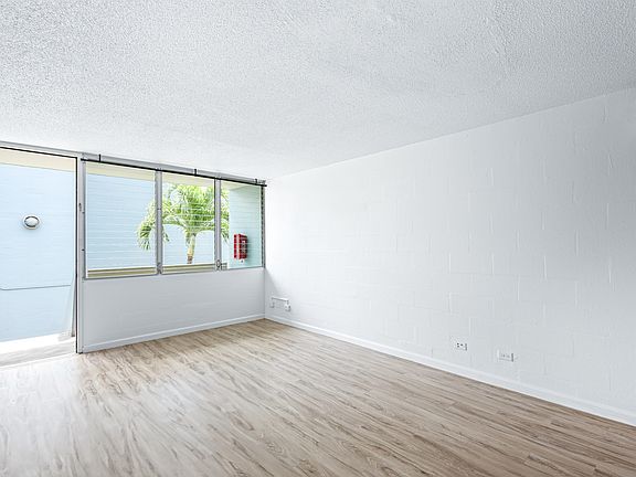 Spacious three-bedroom layout with large windows and an open floor plan perfect for comfortable everyday living.