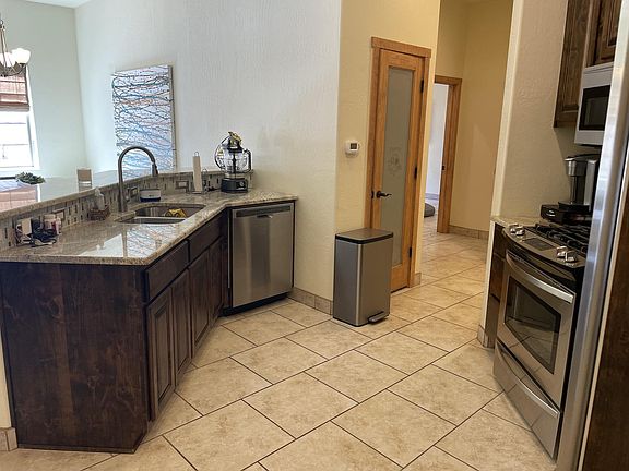 5th image of 5043 Costa Uasca Dr NW