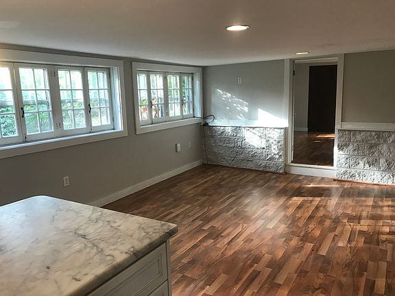 large wall of windows lets in a lot of natural light