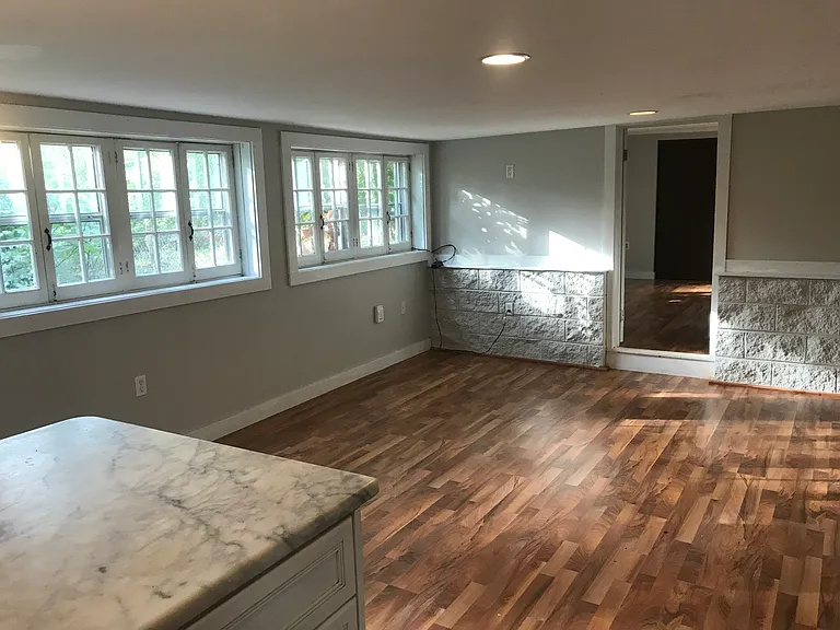 large wall of windows lets in a lot of natural light