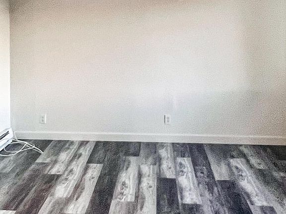 Bedroom: New flooring, freshly painted, and new heating/cooling system!