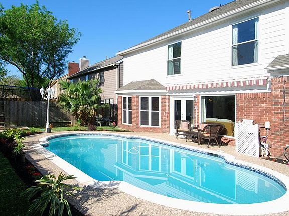 Need cover? Enjoy the shade with your Sunshade. French door entry into your backyard oasis