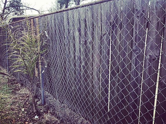 Fenced on all sides.