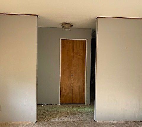 Living room to entry closet