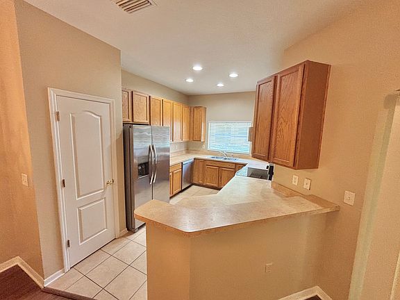 5th image of 9906 Venetian River Way