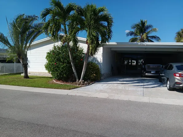 587 Black Bear Rd, Naples, FL 34113