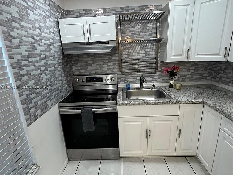 6150 NW 62nd St #106 — Photo 18