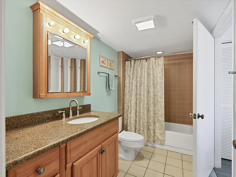 2nd bath off of living area and shared with 2nd bedroom