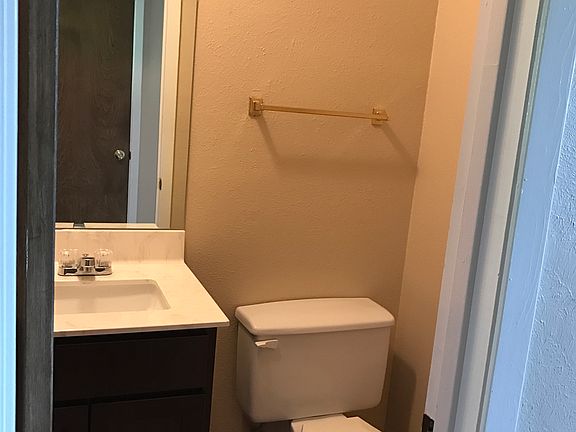Bathrooms have new cultured marble vanities and new faucets.
