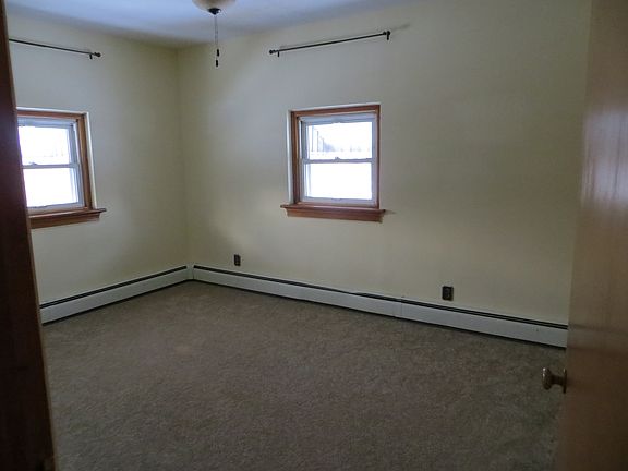 Bedroom with Ceiling fan and cedar closet